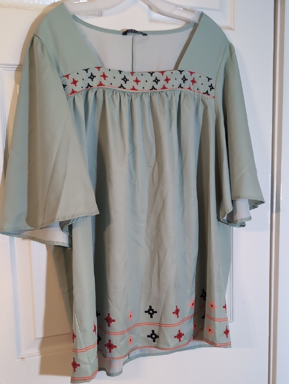 BloomChic Light Sage Top with Black Logo Tag